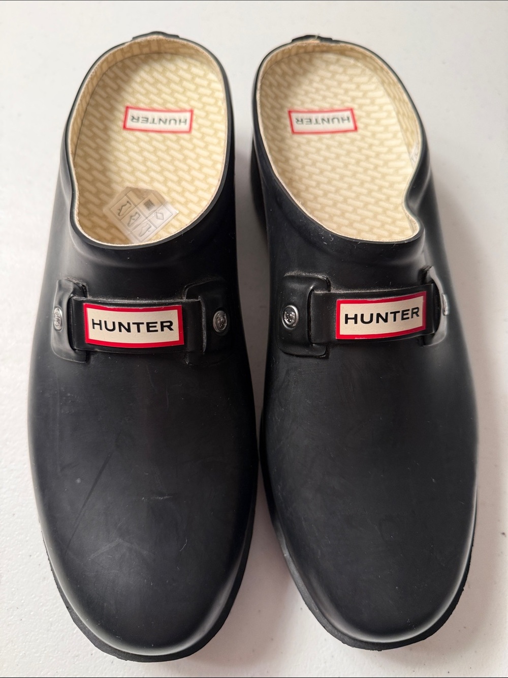 Hunter Black Slip-On Clogs with Red Logo Plaque
